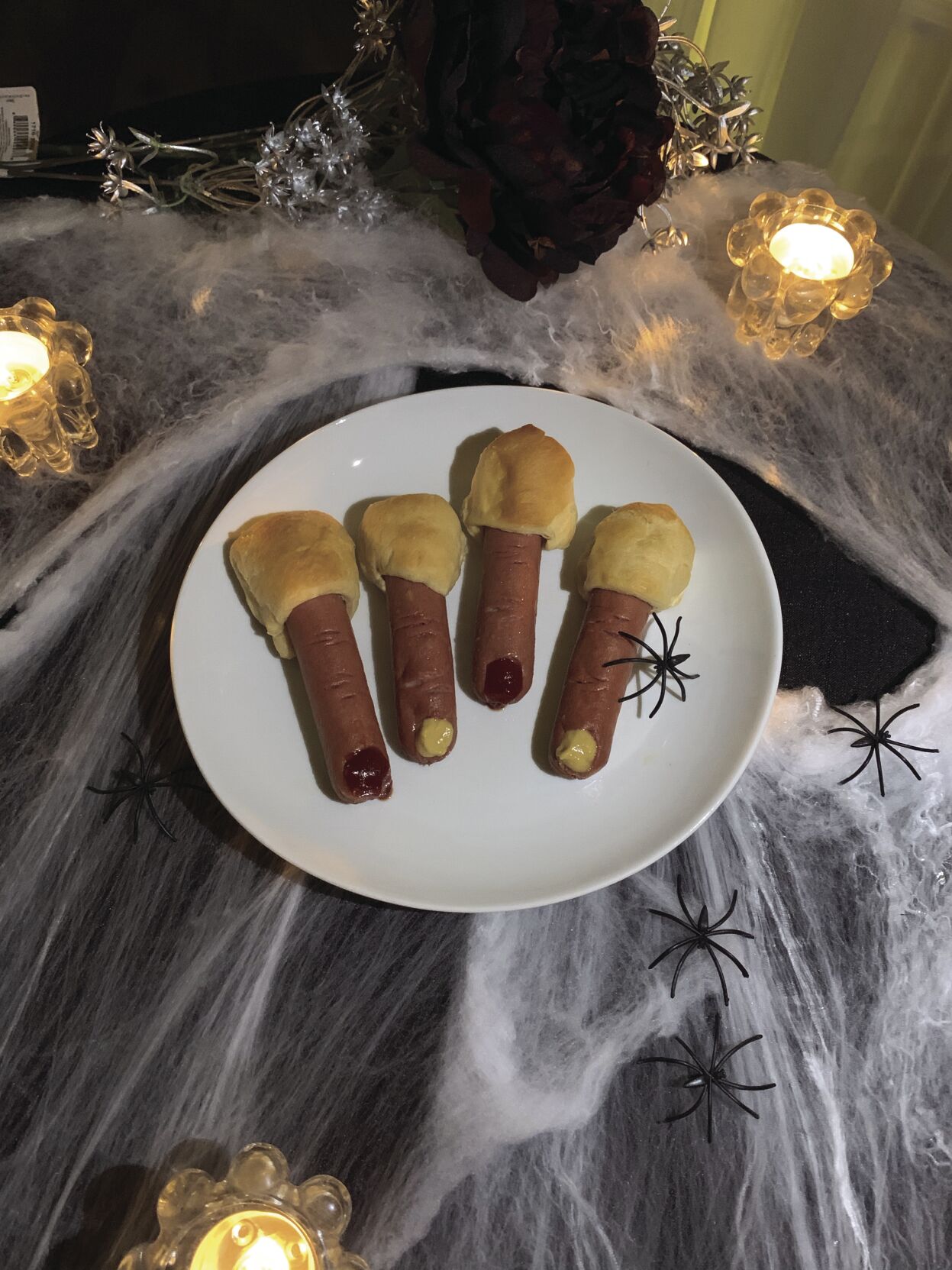 Hot dogs on a spooky plate